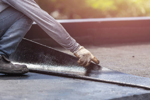 Professional Basement Waterproofing technician working in Marne, MI